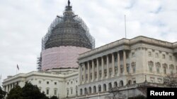 FILE - The U.S. Capitol stands in Washington January 20, 2015. 