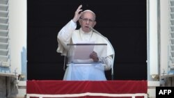 Pope Francis delivers a speech to the faithful prior to the Angelus prayer, Aug. 19, 2018, at St. Peter's square in the Vatican. 