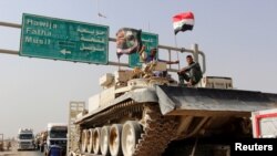 Konvoi pasukan keamanan Irak bergerak ke Mosul untuk memerangi ISIS, 12 Oktober 2016 (REUTERS/Ako Rasheed).