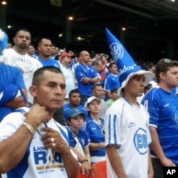 Two of the Salvadoran Fans cheering on their team which lost to Panama in a shootout