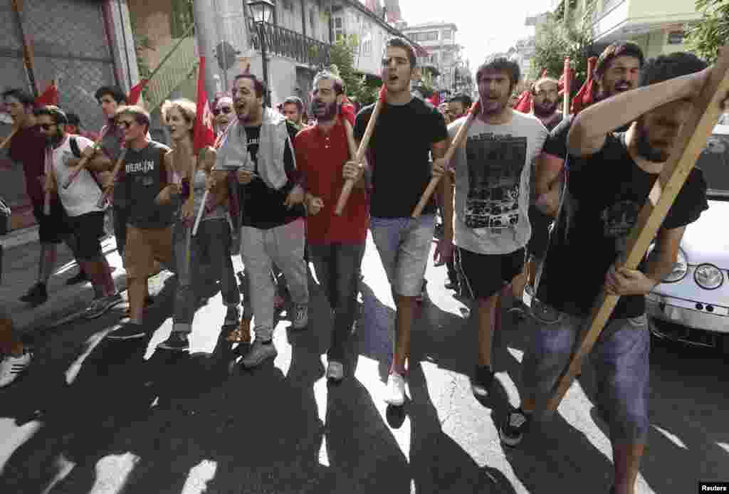 Protesters shout slogans during an anti-fascist rally following the killing of Greek rapper Pavlos Fissas by a supporter of the far-right Golden Dawn group, in Nikaia, a suburb of Athens, Greece.