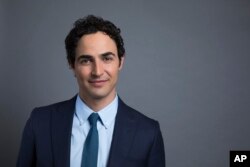 Zac Posen poses for a photo to promote his new documentary, "House of Z," in New York, July 31, 2017.