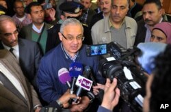 Egyptian Minister of Tourism Hisham Zaazoua talks to journalists at the four-star Bella Vista Hotel, the scene of an knife attack Friday that injured three tourists, in the Red Sea resort of Hurghada, Egypt, Jan. 9, 2016.