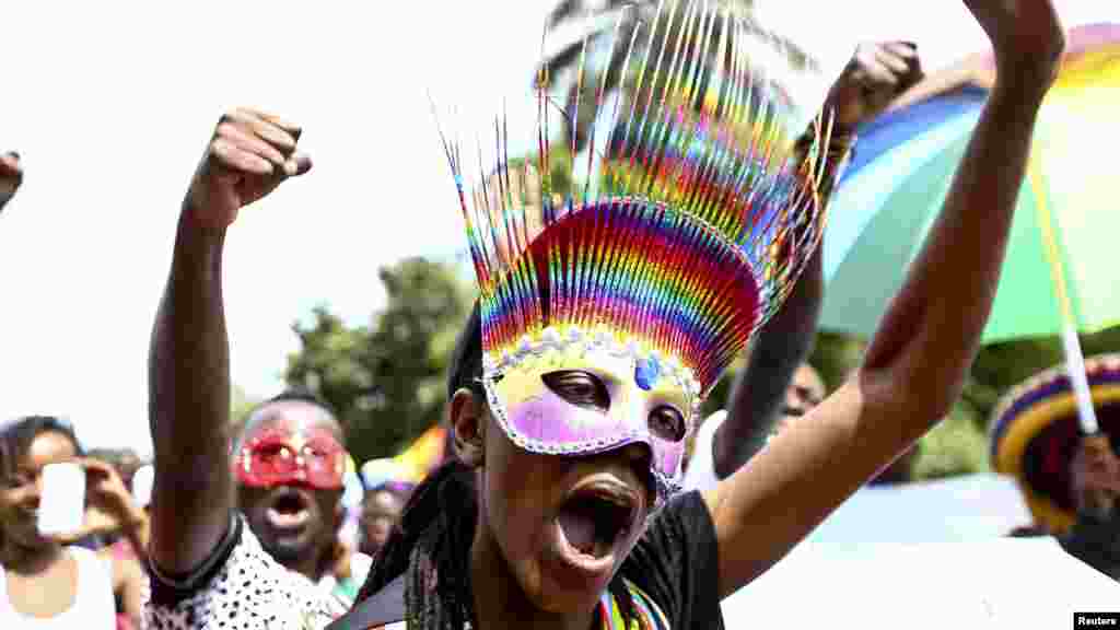 People walk in a parade as they celebrate the annulment of an anti-homosexuality law by Uganda&#39;s constitutional court in Entebbe, Aug. 9, 2014.
