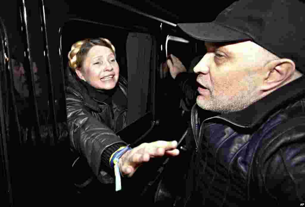 Former Ukrainian Prime Minister Yulia Tymoshenko is greeted by supporters shortly after being freed from prison in Kharkiv. Tymoshenko said she will run for president in May. 