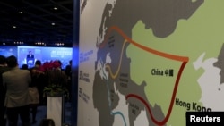 FILE - A map illustrating China's silk road economic belt and the 21st century maritime silk road, or the so-called "One Belt, One Road" megaproject, is displayed at the Asian Financial Forum in Hong Kong, China.