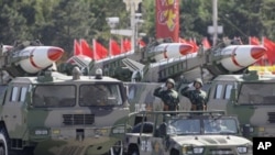 Missiles are displayed in a parade to celebrate the 60th anniversary of China's founding, Beijing, Oct. 1, 2009.