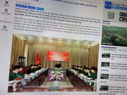 A state media article from March 17, 2021 with a picture of a meeting marking five years since the creation of Vietnam's 'Force 47' cyber army is displayed on screen in this picture takenJuly 8, 2021. (TRUYENHINHNGHEAN.VN via REUTERS)