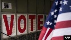 Signage is seen at an early voting center in Minneapolis, Minnesota, Sept. 23, 2016.