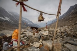 A Hindu holy man meditates near the Gangotri Glacier at an altitude of 4000 meters in the northern Indian state of Uttarakhand, May 11, 2019.