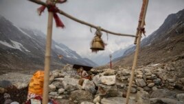 A Hindu holy man meditates near the Gangotri Glacier at an altitude of 4000 meters in the northern Indian state of Uttarakhand, May 11, 2019.