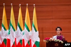Myanmar's State Counsellor Aung San Suu Kyi delivers a national address in Naypyidaw on September 19, 2017.