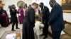 Pope Francis kneels to kiss feet of the President of South Sudan Salva Kiir at the end of a two day spiritual retreat with South Sudan leaders at the Vatican, April 11, 2019. 