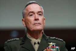 FILE - Joint Chiefs Chairman Gen. Joseph Dunford listens on Capitol Hill in Washington, June 13, 2017.