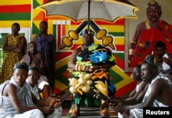 Chief of Nkwantakese, Nana Boakye Yam Ababio II, welcomes members of a heritage tour group who are traveling to Ghana to explore their ancestral roots, in Ashanti region, Ghana August 10, 2019. Picture taken August 10, 2019. REUTERS/Francis Kokoroko