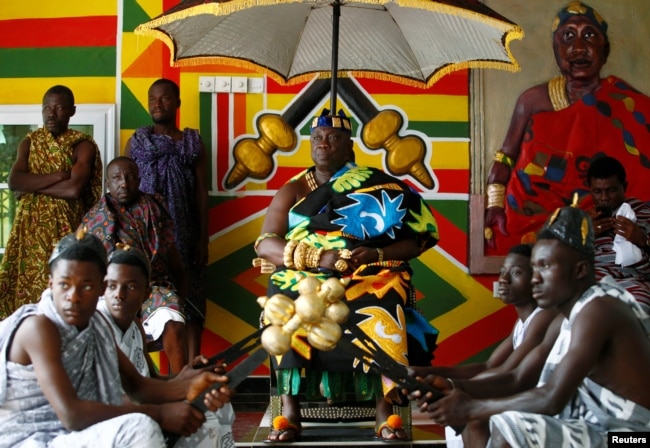 Chief of Nkwantakese, Nana Boakye Yam Ababio II, welcomes members of a heritage tour group who are traveling to Ghana to explore their ancestral roots, in Ashanti region, Ghana August 10, 2019. Picture taken August 10, 2019. REUTERS/Francis Kokoroko