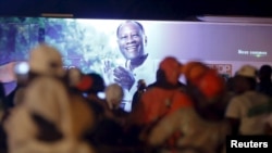 Supporters of Ivory Coast's President Alassane Ouattara and his party, the Rally of the Houphouetists for Democracy and Peace, attend concert to celebrate his victory in Abidjan, Ivory Coast, October 28, 2015.