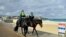 Mounted police patrol along Bondi Beach in Sydney, June 28, 2021.