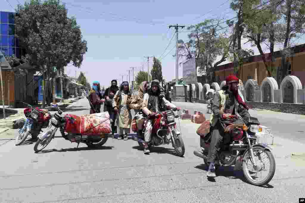 Taliban fighters patrol inside the city of Ghazni, southwest of Kabul, Afghanistan. The Taliban captured the provincial capital near Kabul, the 10th area the insurgents have taken in a week, as the U.S. and NATO prepare to withdraw fully from the country after years of war.&nbsp;