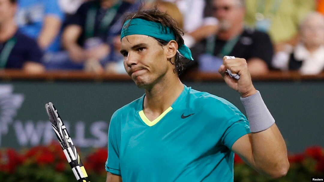 Rafael Nadal dari Spanyol merayakan kemenangan atas Roger Federer dari Swiss dalam perempat final BNP Paribas Terbuka. (Reuters/Danny Moloshok)