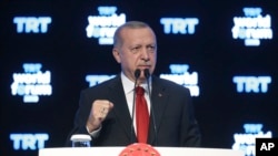 Turkish President Recep Tayyip Erdogan speaks at a forum organized by Turkish TRT World broadcaster, in Istanbul, Oct. 21, 2019. 