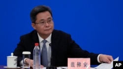 FILE - China's Finance Minister Lan Foan speaks at a news conference on a plan to boost the economy at the Great Hall of the People in Beijing, Nov. 8, 2024. 