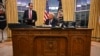 President Donald Trump speaks to journalists as he signs executive orders in the Oval Office of the White House in Washington, on Jan. 20, 2025.