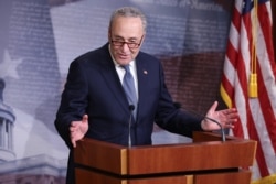 Minority Leader Charles Schumer (D-NY) talks to reporters on April 21, 2020 in Washington.