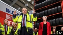 Britain's Prime Minister Boris Johnson talks during a question and answer session, part of a General Election campaign visit to Ferguson's Transport in Washington, England, Dec. 9, 2019. 