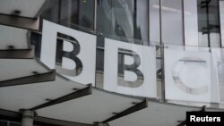 FILE - Signage is seen at BBC offices and recording studios, in London, Britain, May 21, 2021.