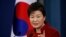 South Korean President Park Geun-hye answers to a reporter's question during her news conference at the Presidential Blue House in Seoul, South Korea, Wednesday, Jan. 13, 2016.