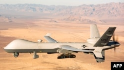 这张由美国空军于2020年11月7日公布的照片展示了美军研发的MQ-9型无人机。