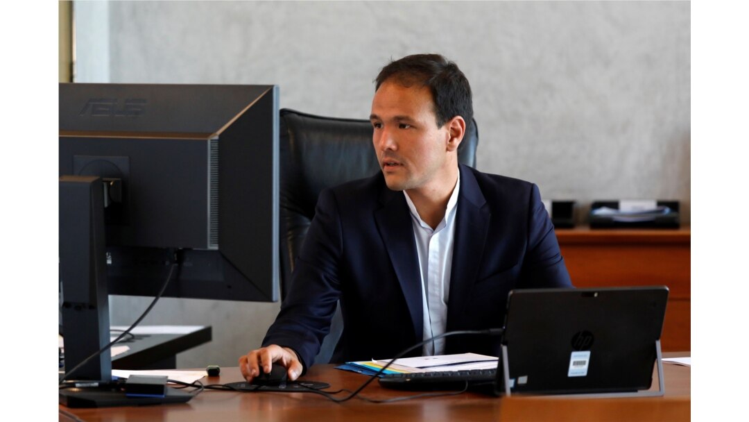 FILE - Cedric O, French junior minister for the digital sector, poses in his office in Paris.