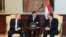 Egyptian President Abdel-Fattah el-Sissi, right, talks to Russian President Vladimir Putin during their meeting in Cairo, Egypt, Feb. 09, 2015. 