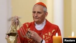 资料照：教宗方济各和平特使、意大利主教团主席马泰奥·祖皮(Matteo Zuppi)枢机主教在莫斯科天主之母主教座堂做弥撒。（2023年6月29日）