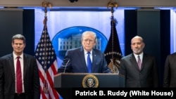 资料照片：2026年2月20日，特朗普总统就最高法院关于关税的裁决在白宫发表讲话。