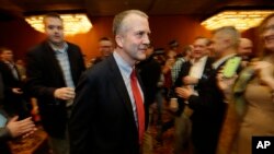 Alaska Republican Dan Sullivan says he has defeated Democrat Dan Sullivan in a bid for the U.S. Senate. He's shown at an election party in Anchorage Nov. 4, 2014.