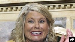 Sharon Bialek, a Chicago-area woman, during a news conference at the Friars Club in New York, Nov. 7, 2011.