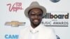 Will.i.am arrives at the Billboard Music Awards at the MGM Grand Garden Arena in Las Vegas, May 19, 2013. 