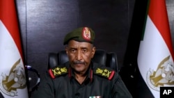 FILE - In this image made from video provided Friday, April 21, 2023, by the Sudan Armed Forces, Gen. Abdel-Fattah Burhan, commander of the Sudanese Armed Forces, speaks at an undisclosed location.