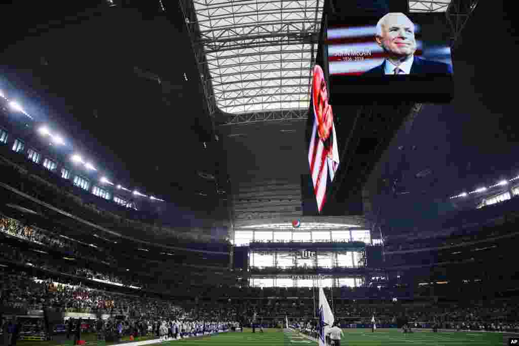 Former Senator John McCain is memorialized before a preseason NFL football game between the Dallas Cowboys and the Arizona Cardinals in Arlington, Texas, Aug. 26, 2018. 