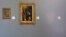 FILE - The empty space where Henri Matisse' painting "La Liseuse en Blanc et Jaune" was hanging, right, is seen next to a painting by Maurice Denis, center, and Pierre Bonnard, left, at Kunsthal museum in Rotterdam, Netherlands, Oct. 16, 2012.