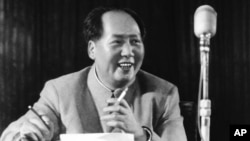 FILE - Chairman Mao Zedong at general assembly of the Chinese communist party in March 1955.