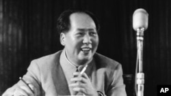 FILE - Chairman Mao Zedong at general assembly of the Chinese communist party in March 1955.