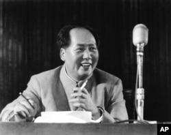 FILE - Chairman Mao Zedong at general assembly of the Chinese communist party in March 1955.
