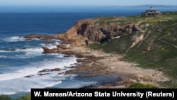 The Pinnacle Point archeological locality on the south coast of South Africa, a rock shelter, called PP5-6, used by humans from about 90,000 to 50,000 years ago, near the town of Mossel Bay viewed from the northeast is seen in this 2014 photo released Mar. 2, 2018. (Photo Courtesy Curtis W. Marean/Arizona State University/Handout via REUTERS)