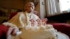 FILE - Emma Morano holds a cake with candles marking 117 years on the day of her birthday, Nov. 29, 2016, in Verbania, Italy. A new study says that while the number of centenarians will grow, humans are hitting the upper limit of life expectancy.