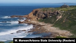 The Pinnacle Point archeological locality on the south coast of South Africa, a rock shelter, called PP5-6, used by humans from about 90,000 to 50,000 years ago, near the town of Mossel Bay viewed from the northeast is seen in this 2014 photo released March 12, 2018.