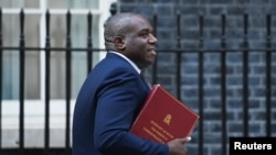 FILE - Britain's Foreign Secretary David Lammy walks on Downing Street in London, Sept. 17, 2024.