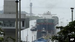 The Neopanamax cargo ship, Cosco Shipping Panama, approaches the new new Agua Clara locks, part of the Panama Canal expansion project, near the port city of Colon, Panama, June 26, 2016.